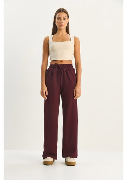 Kadın Yüksek Bel Lastikli Bağcıklı Dökümlü Bol Paça Pantolon fiyatları