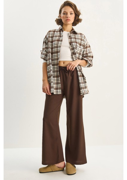 Kadın Yüksek Bel Beli Lastikli Bağlama Detaylı Cepli Kumaş Bol Pantolon