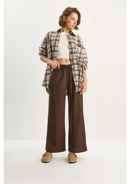 Kadın Yüksek Bel Beli Lastikli Bağlama Detaylı Cepli Kumaş Bol Pantolon fiyatları