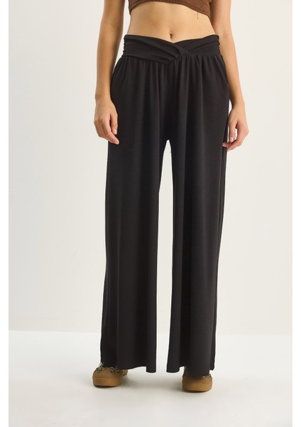 Kadın Asimetrik Bel Detaylı Cepli Rahat Modal Pantolon fırsatları