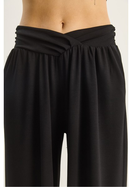 Kadın Asimetrik Bel Detaylı Cepli Rahat Modal Pantolon