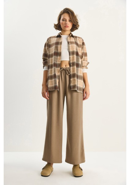 Kadın Yüksek Bel Beli Lastikli Bağlama Detaylı Cepli Kumaş Bol Pantolon fiyatları