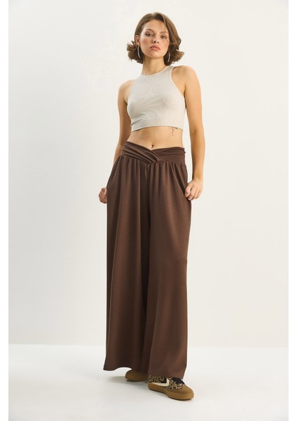 Kadın Asimetrik Bel Detaylı Cepli Rahat Modal Pantolon fırsatları