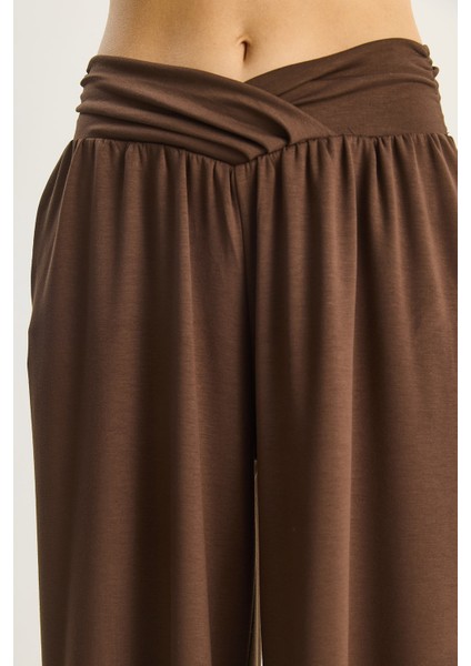 Kadın Asimetrik Bel Detaylı Cepli Rahat Modal Pantolon indirimleri