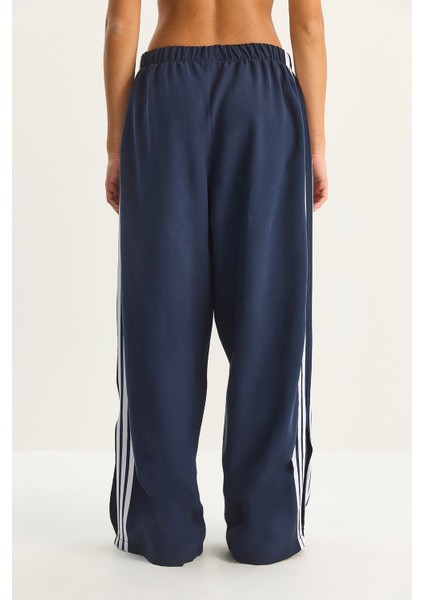 Kadın Şeritli Beli Lastikli Cep Detaylı Mevsimlik Palazzo Pantolon