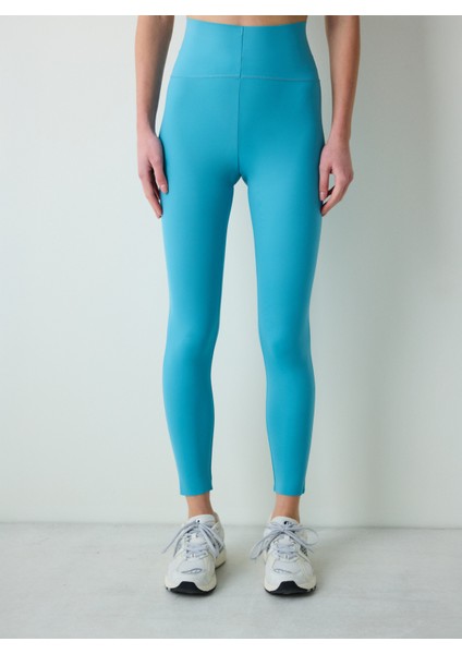 Turkuaz Mavi Yüksel Bel Toparlayıcı Bilek Boy Form Tayt