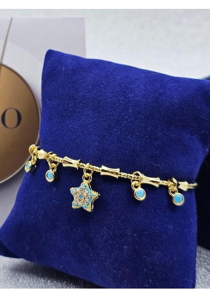 Charmlı Kemik Model Gold ve Mavi Detaylı Çelik Bileklik