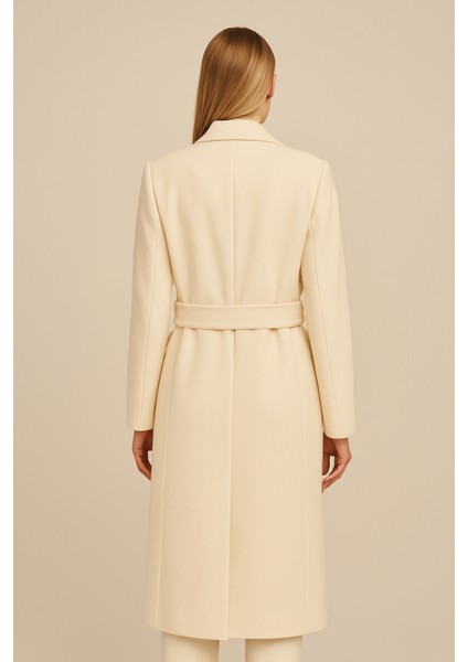 Krem Düğme Detaylı Kuşaklı Uzun Kaban modelleri