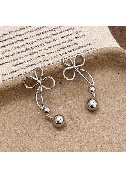 Bükülmüş Çiçekli Inci Püsküllü Fişkili Küpeler (Yurt Dışından) modelleri