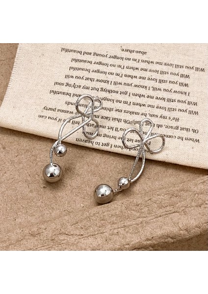 Bükülmüş Çiçekli Inci Püsküllü Fişkili Küpeler (Yurt Dışından) fırsatları