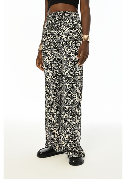 Kadın Beli Lastikli Bol Paça Karışık Siyah Beyaz Desenli Pantolon fiyatları