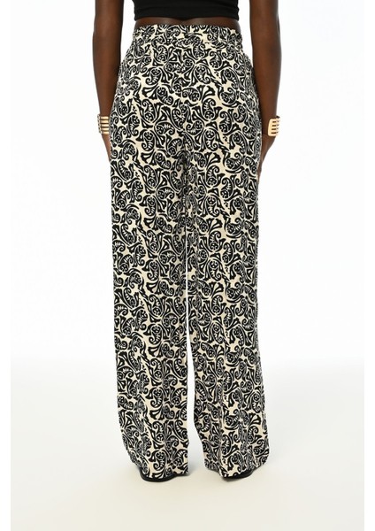Kadın Beli Lastikli Bol Paça Karışık Siyah Beyaz Desenli Pantolon fırsatları