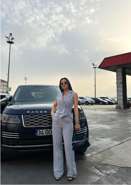 Kadın Çizgili Asimetrik Kesim Yelek Palazzo Pantolon Takım Elbise