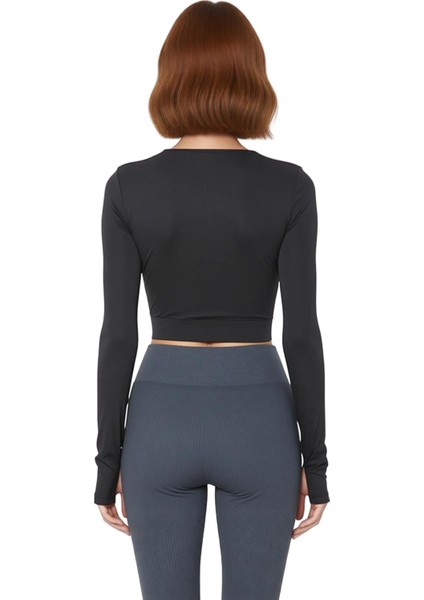 Kadın Crop Bisiklet Yaka Fitted Kalıp Örme Koyu Pencere Cut Out ve Baş Parmak Delik Spor Üst Bluz modelleri