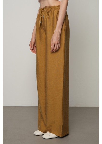 Kadın Düz Renk Beli Lastikli Bol Paça Pantolon fiyatları