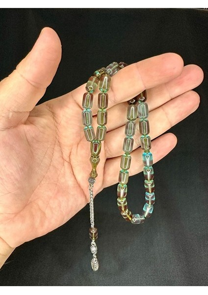 ATEŞ KEHRİBAR TESBİH KAPSÜL KESİM TURKUAZ RENK 12MM X 7MM T-534 indirimleri