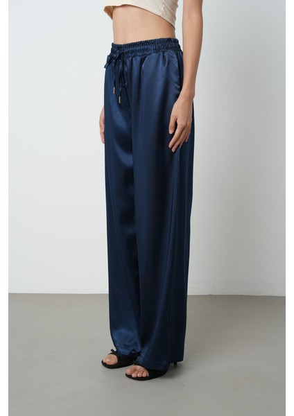 Kadın Açık Lacivert Renk Saten Bol Paça Beli Lastikli Pantolon fiyatları
