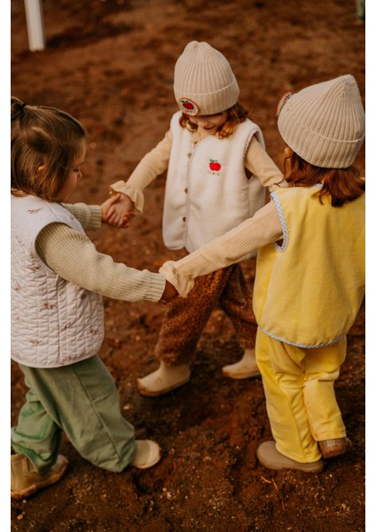 Helikopter Desenli Peluş Krem Yelek fırsatları