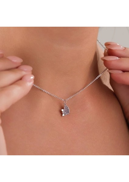 Kadın Kalp Kolye – Fiyonk Detaylı Zirkon Taşlı, Kararmaz Gümüş Kaplama Çelik Tasarım modelleri
