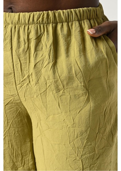 Kadın Beli Lastikli Bol Paça Kırışık Kumaş Düz Renk Pantolon modelleri
