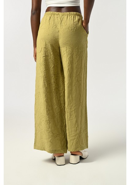 Kadın Beli Lastikli Bol Paça Kırışık Kumaş Düz Renk Pantolon fırsatları