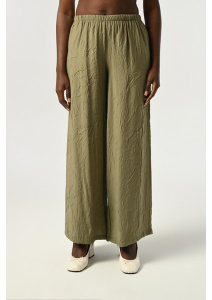 Kadın Beli Lastikli Bol Paça Kırışık Kumaş Düz Renk Pantolon