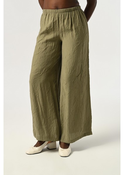 Kadın Beli Lastikli Bol Paça Kırışık Kumaş Düz Renk Pantolon fiyatları
