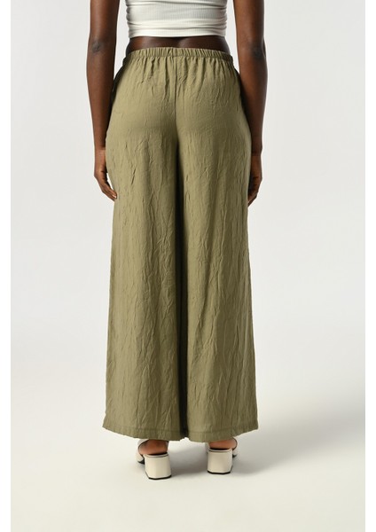 Kadın Beli Lastikli Bol Paça Kırışık Kumaş Düz Renk Pantolon indirimleri
