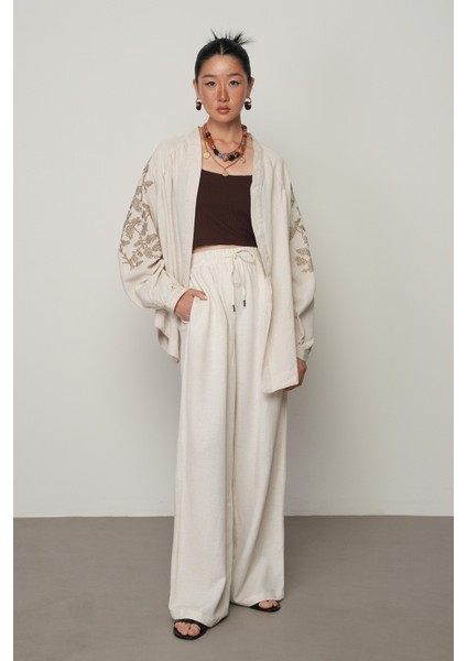 Kadın Natur Renk Düz Bol Paça Beli Lastikli Pantolon fiyatları