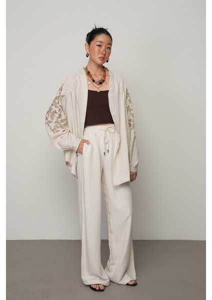 Kadın Natur Renk Düz Bol Paça Beli Lastikli Pantolon fırsatları