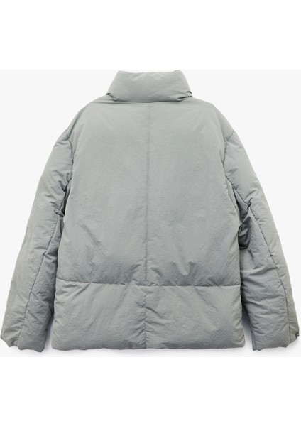 Uzun Kollu Kapaklı Cep Detaylı Fermuarlı Slim Fit Dik Yaka Kışlık Şişme Mont fırsatları