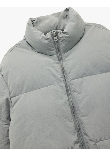 Uzun Kollu Kapaklı Cep Detaylı Fermuarlı Slim Fit Dik Yaka Kışlık Şişme Mont indirimleri