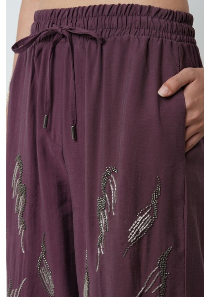 Kadın Önü Taş Işlemeli Düz Renk Beli Lastikli Bol Paça Pantolon fırsatları