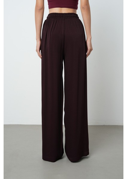 Kadın Düz Renk Altın Rengi Bağcık Detaylı Bol Paça Beli Lastikli Pantolon indirimleri