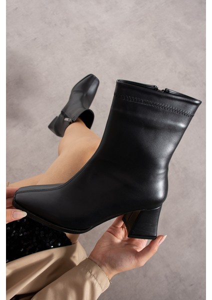Carmen Siyah Renkli Fermuar Detaylı Küt Burun Kadın Topuklu Bot fırsatları