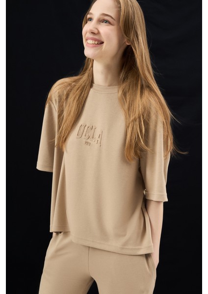 Jayla Koyu Bej Bisiklet Yaka Gofre Baskı Loose Fit Kadın Tshirt modelleri