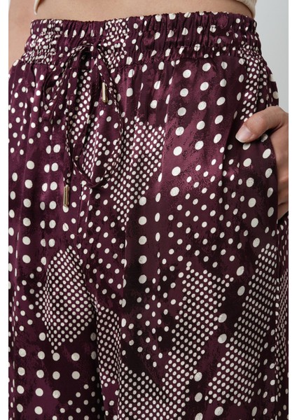 Kadın Bordo Renk Puantiye Desenli Bol Paça Beli Lastikli Pantolon fırsatları