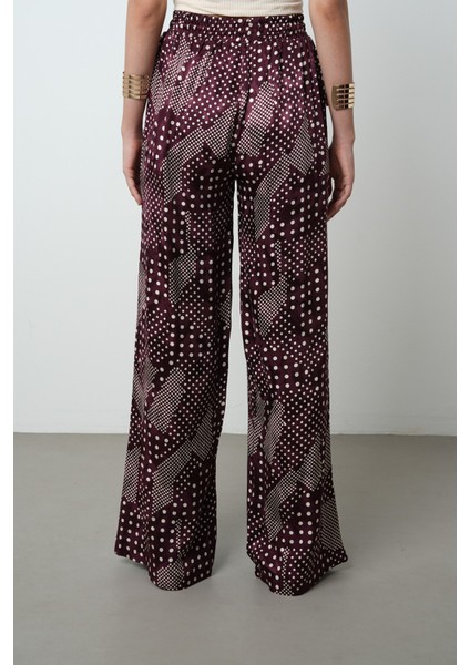 Kadın Bordo Renk Puantiye Desenli Bol Paça Beli Lastikli Pantolon indirimleri