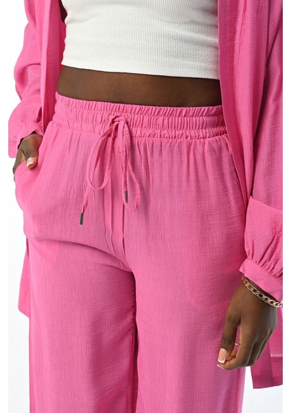 Kadın Rahat Kalıp Bol Paça Beli Lastikli Düz Renk Pantolon fiyatları