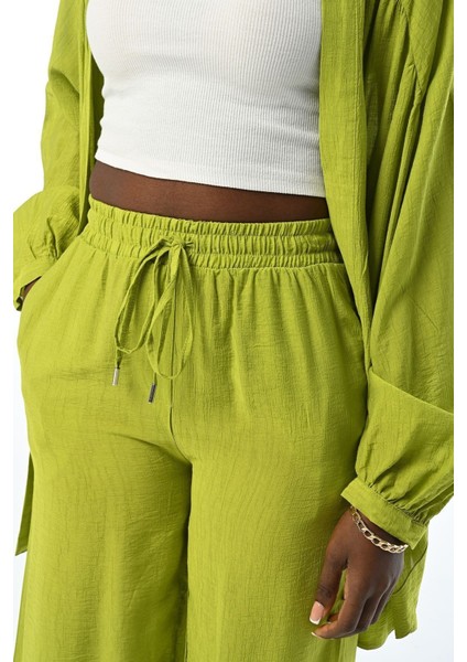 Kadın Rahat Kalıp Bol Paça Beli Lastikli Düz Renk Pantolon modelleri