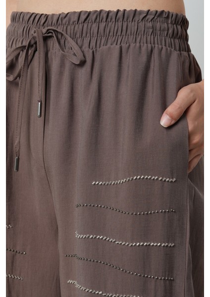 Kadın Yatay Şerit Taş Işlemeli Düz Renk Beli Lastikli Bol Paça Pantolon fırsatları