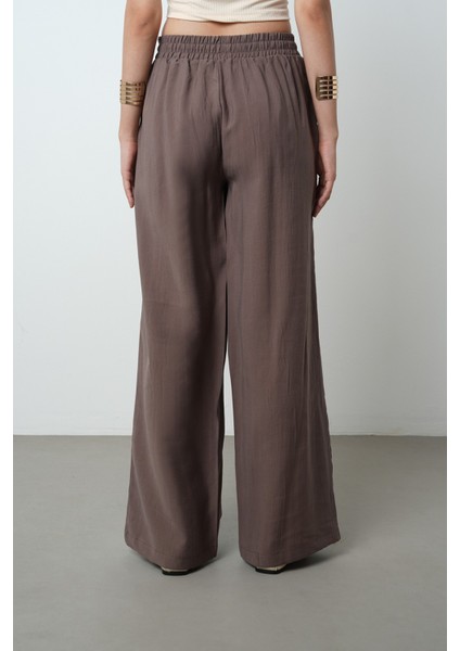 Kadın Yatay Şerit Taş Işlemeli Düz Renk Beli Lastikli Bol Paça Pantolon indirimleri