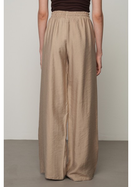 Kadın Düz Renk Beli Lastikli Bol Paça Pantolon indirimleri