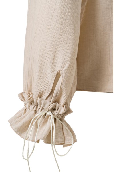 Önden Bağlamalı Fırfırlı Bluz Ekru fırsatları