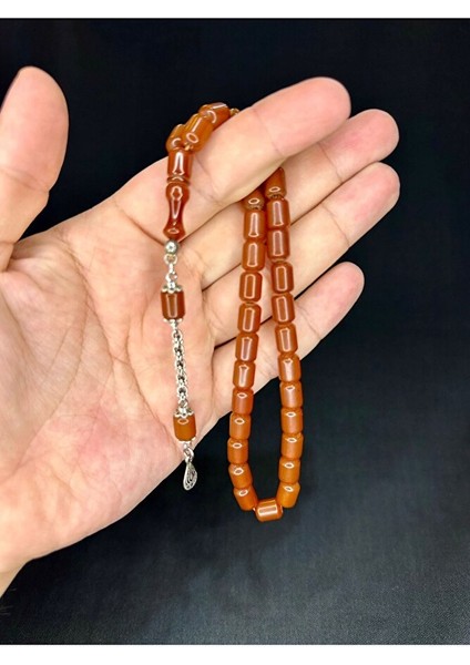 ÇUBUK KEHRİBAR TESBİH KAHVERENGİ RENK KAPSÜL KESİM 11MM X 7 MM T-542 indirimleri