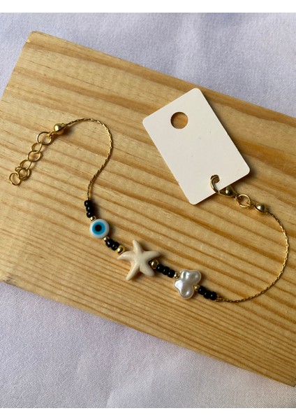 Gold Siyah Taşlı Beyaz Deniz Yıldızlı Bileklik modelleri