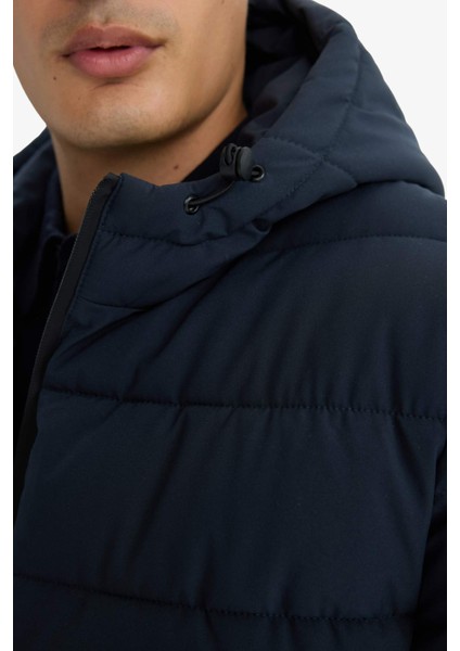 Su İtici Slim Fit Dar Kesim Astarlı Kapüşonlu Fermuarlı Cepli Dolgulu Mont R0216AZ25AU indirimleri