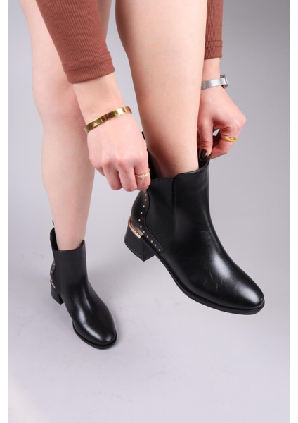 Bruce Trok ve Lastik Detaylı Topuklu Bot Siyah modelleri