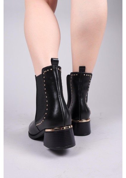 Bruce Trok ve Lastik Detaylı Topuklu Bot Siyah fırsatları