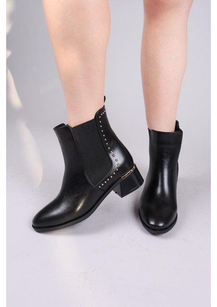 Bruce Trok ve Lastik Detaylı Topuklu Bot Siyah indirimleri